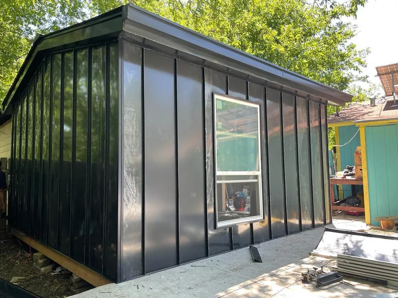 Black standing seam metal wall panels for Metal Roof Installation in Sienna